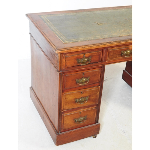 792 - A 19th century Victorian mahogany twin pedestal office writing desk. The desk raised on twin pedesta... 