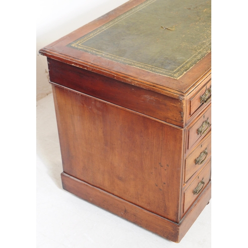 792 - A 19th century Victorian mahogany twin pedestal office writing desk. The desk raised on twin pedesta... 