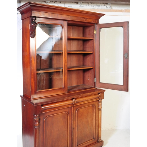 797 - A 19th century Victorian mahogany library bookcase cabinet. The bookcase raised on a plinth base bel... 