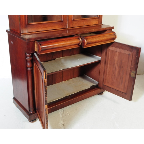 797 - A 19th century Victorian mahogany library bookcase cabinet. The bookcase raised on a plinth base bel... 