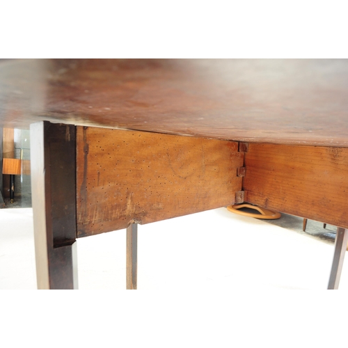 798 - An 18th century George III oak drop leaf dining table. The table raised on square legs, having full-... 