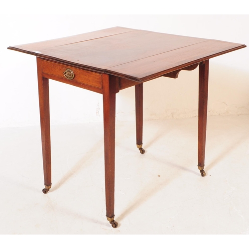 801 - A 19th century George III mahogany pembroke table. Raised on square tapering legs terminating in cas... 