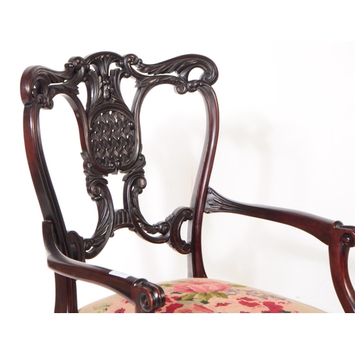 804 - An early 20th century Edwardian Chippendale revival mahogany bedroom armchair. The chair raised on s... 