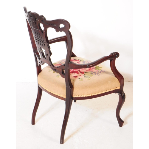 804 - An early 20th century Edwardian Chippendale revival mahogany bedroom armchair. The chair raised on s... 