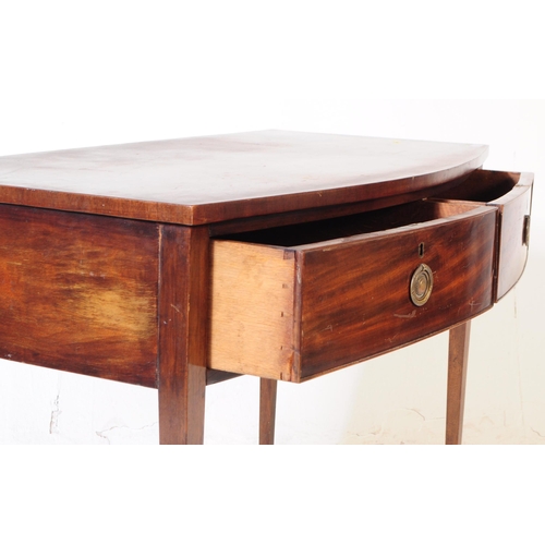 811 - George III 19th century mahogany writing table / desk. Rectangular form with bow front two parallel ... 