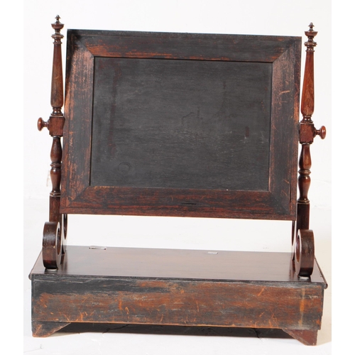 823 - A mid 19th Century Victorian mahogany toilet swing mirror. With turned supports on trestle legs upon... 