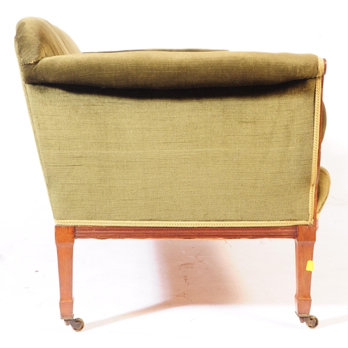 825 - An early 20th Century Edwardian mahogany inlaid two seater sofa / salon settee. With green upholster... 