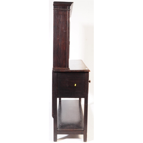 829 - An early 20th century circa. 1920s Jacobean revival ebonised sideboard dresser. Rectangular form wit... 