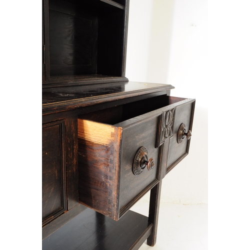 829 - An early 20th century circa. 1920s Jacobean revival ebonised sideboard dresser. Rectangular form wit... 