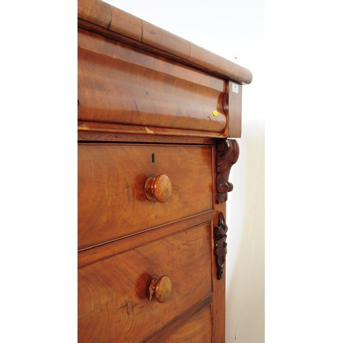 839 - A 19th century Victorian mahogany chest of drawers. Of rectangular form with a bank of two short dra... 