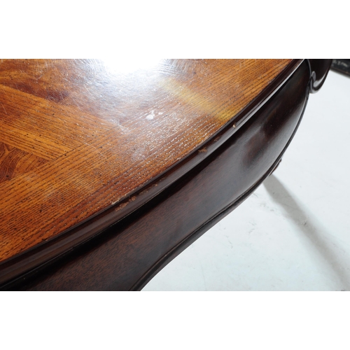 849 - A contemporary painted dining table with six chairs. Of oval form with extending capabilities. Figur... 