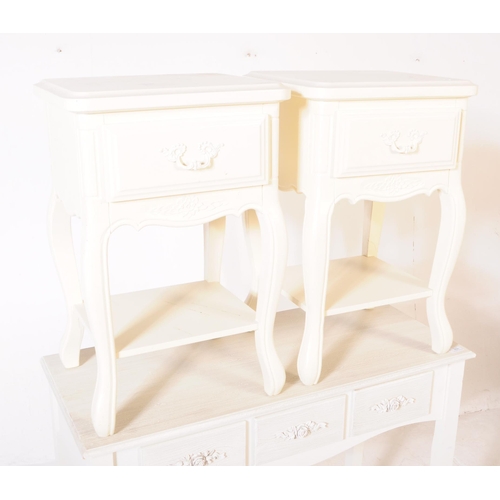 850 - A pair of contemporary Louis XVI manner bedside tables, alongside a dressing / hall table, The bedsi... 