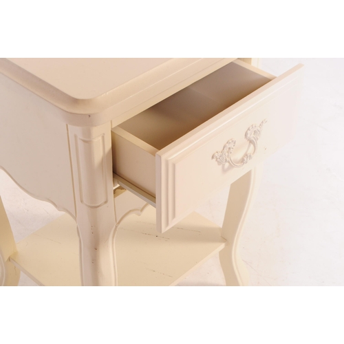 850 - A pair of contemporary Louis XVI manner bedside tables, alongside a dressing / hall table, The bedsi... 