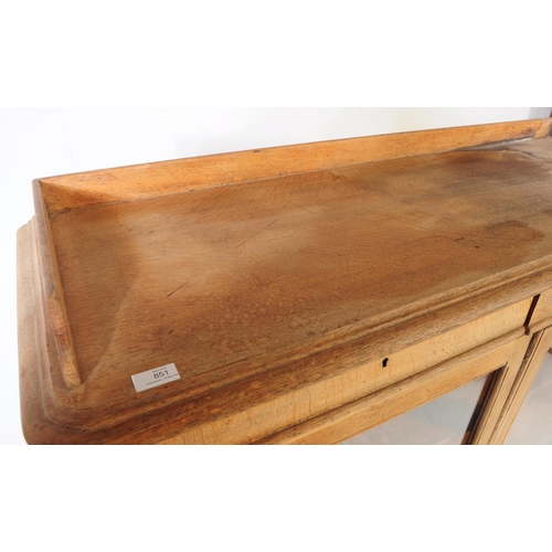 851 - A 19th century Victorian pine pier cupboard / library bookcase. The cabinet having two glazed doors ... 