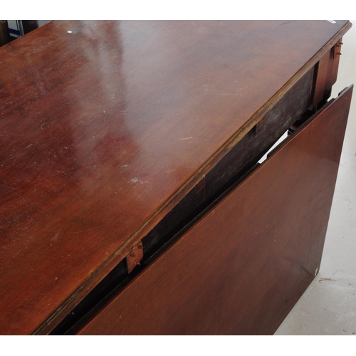 854 - A 19th century Georgian burr mahogany drop leaf table. Rectangular form with carved sunburst panels ... 