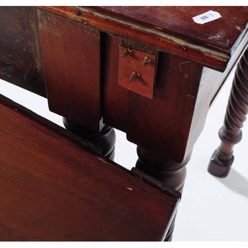 854 - A 19th century Georgian burr mahogany drop leaf table. Rectangular form with carved sunburst panels ... 