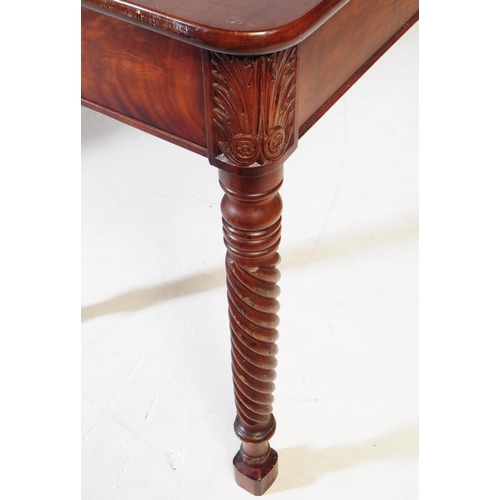 854 - A 19th century Georgian burr mahogany drop leaf table. Rectangular form with carved sunburst panels ... 