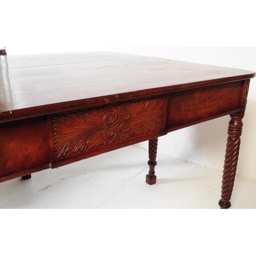 854 - A 19th century Georgian burr mahogany drop leaf table. Rectangular form with carved sunburst panels ... 