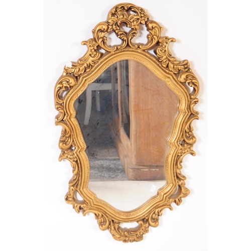 866 - Two Italian rococo manner giltwood and gesso framed wall mirrors. Each mirror featuring a carved roc... 