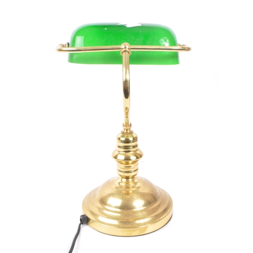 870 - A vintage mid 20th century bankers table top desk lamp light. With a hand blown green glass light sh... 