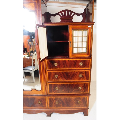 874 - An Edwardian circa 1900s inlaid compactum wardrobe armoire. Of rectangular form with slot in gallery... 