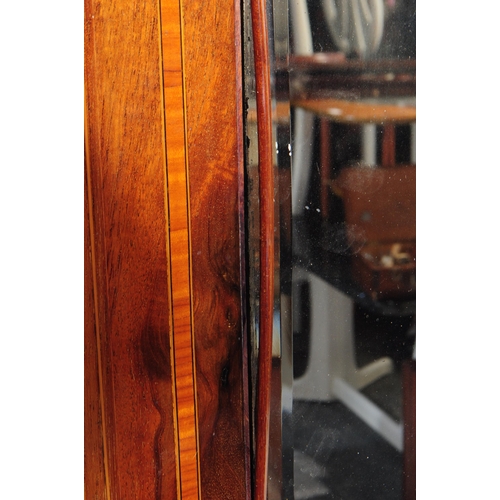 874 - An Edwardian circa 1900s inlaid compactum wardrobe armoire. Of rectangular form with slot in gallery... 