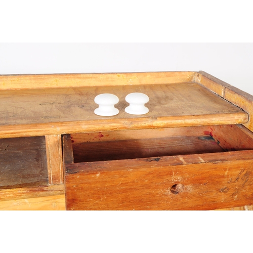 877 - A 19th century Victorian pine sideboard dresser. The sideboard raised on a plinth base below two cup... 