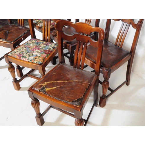 883 - A 20th century Jacobean revival oak cup and cover draw leaf dining table and six chairs. The table o... 