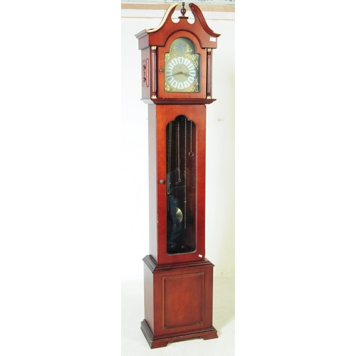 893 - Tempus Fugit - A 20th century Tempus Fugit longcase grandfather clock. The clock having mahogany ven... 