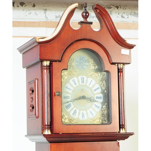 893 - Tempus Fugit - A 20th century Tempus Fugit longcase grandfather clock. The clock having mahogany ven... 