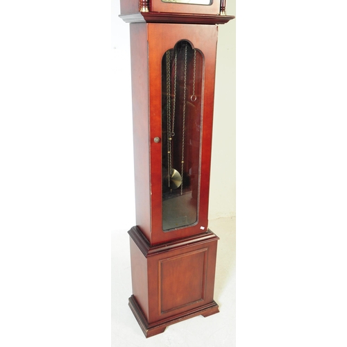 893 - Tempus Fugit - A 20th century Tempus Fugit longcase grandfather clock. The clock having mahogany ven... 