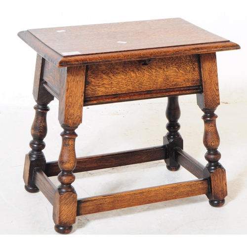 900 - An early 20th century circa 1940s oak wood joint stool / sewing box. The stool raised on block feet ... 