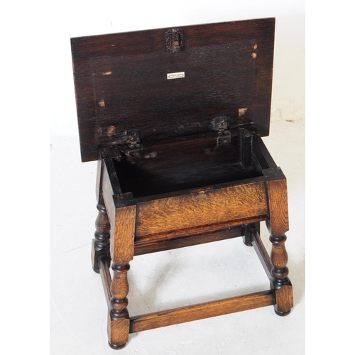 900 - An early 20th century circa 1940s oak wood joint stool / sewing box. The stool raised on block feet ... 