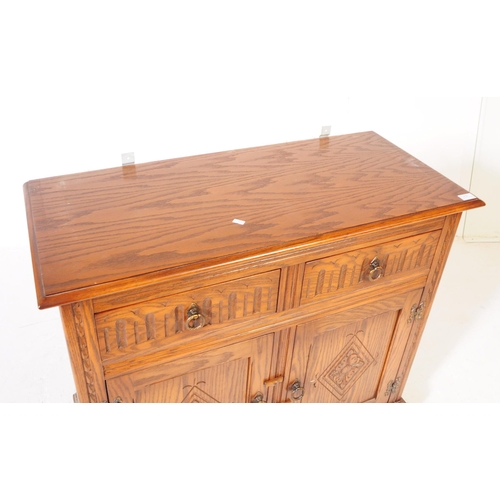 902 - Jaycee - A 20th century Dutch manner oak wood dresser. The dresser raised on a plinth base with twin... 