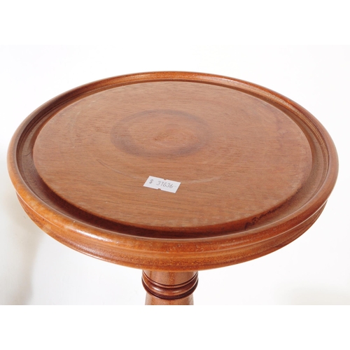 904 - An early 20th century two tier walnut plant stand jardiniere, alongside another oak example. The jar... 