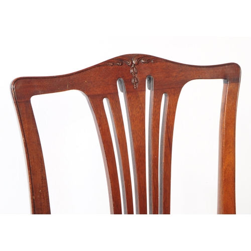 907 - A set of six 19th century George III mahogany dining chairs. The chairs featuring pierced slat backr... 