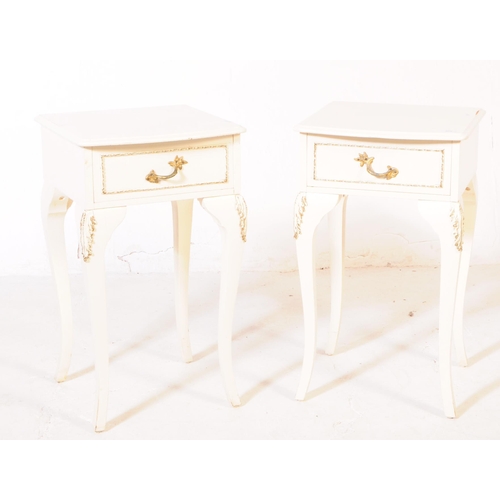 908 - A pair of French Louis XVI revival manner painted bedside tables. The bedsides each raised on long c... 