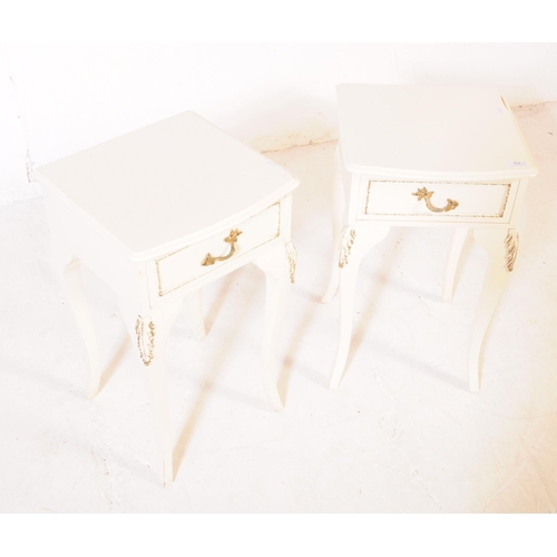 908 - A pair of French Louis XVI revival manner painted bedside tables. The bedsides each raised on long c... 