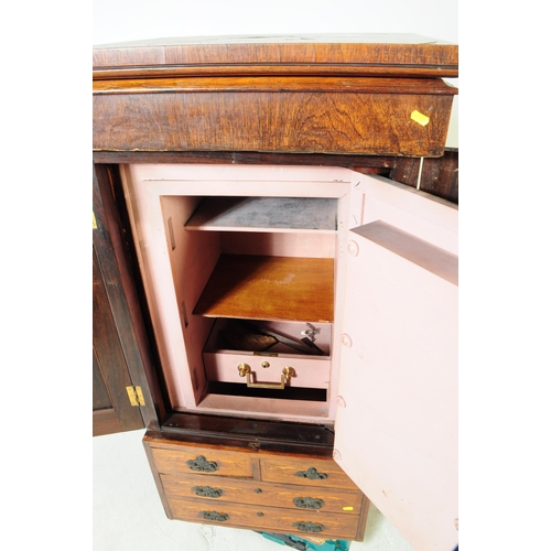 910 - An early 20th century Edwardian mahogany inlaid security safe. The safe of rectangular form, raised ... 