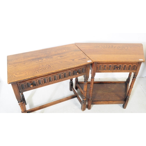 917 - Two 20th century Jacobean revival oak wood console hall tables. One table of rectangular form with t... 