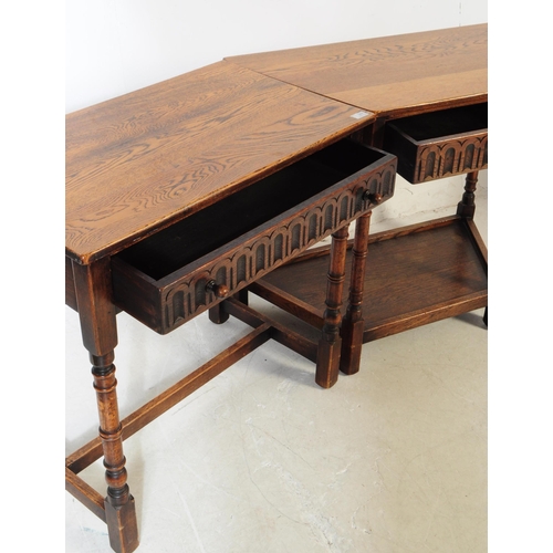 917 - Two 20th century Jacobean revival oak wood console hall tables. One table of rectangular form with t... 