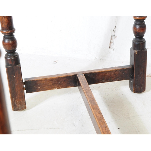 917 - Two 20th century Jacobean revival oak wood console hall tables. One table of rectangular form with t... 