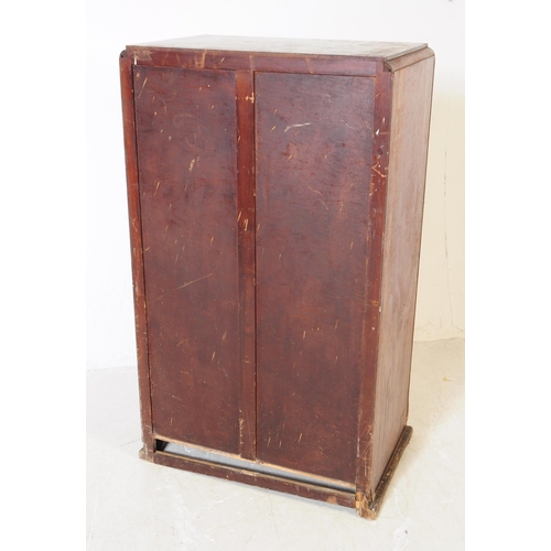 920 - A 20th century circa 1930s Art Deco walnut veneer bachelors wardrobe. Raised on a plinth base the wa... 