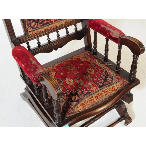 921 - A 19th century Victorian mahogany Boston rocker American manner rocking armchair. The chair having t... 