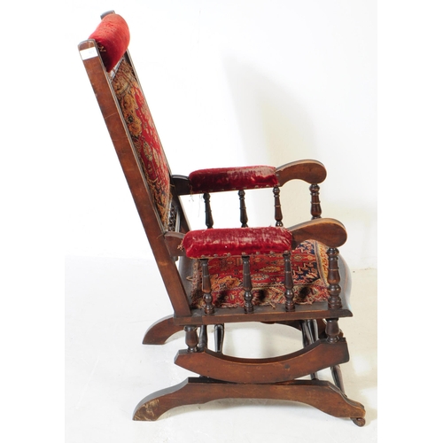 921 - A 19th century Victorian mahogany Boston rocker American manner rocking armchair. The chair having t... 