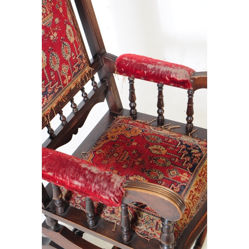 921 - A 19th century Victorian mahogany Boston rocker American manner rocking armchair. The chair having t... 