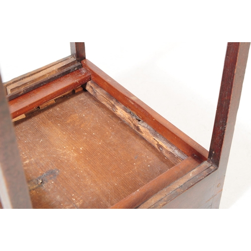 922 - A 19th century George III mahogany side table / work table. The table having an ebonised mourning in... 