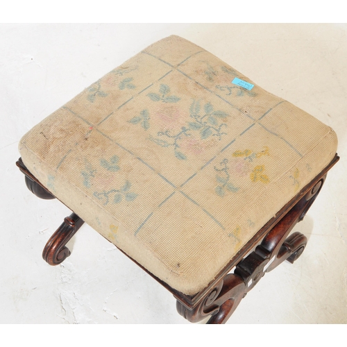 925 - A 19th century Victorian crossed leg mahogany piano stool. The stool having a needlepoint upholstere... 