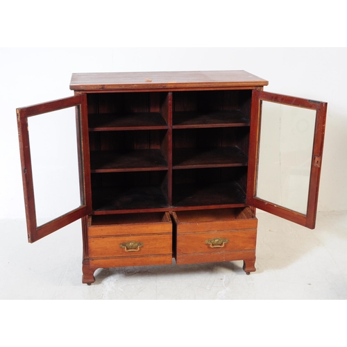 936 - An early 20th century Edwardian mahogany glazed library bookcase display cabinet. Raised on bracket ... 