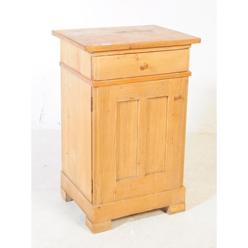 940 - A 20th century Victorian style pine wood bedside table pot cupboard. The bedside raised on block fee... 